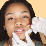 african woman undergoing beauty botox treatmentplastic surgery young african woman receiving botox injection criss cross zone beauty clinic scaled 1.jpg