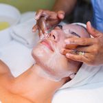 young woman lying cosmetologist s table during rejuvenation procedure scaled 1.jpg